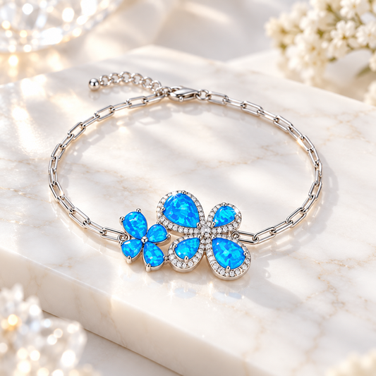 Butterfly Opal Bracelet in rhodium-plated 925 sterling silver with luminous blue opal details
