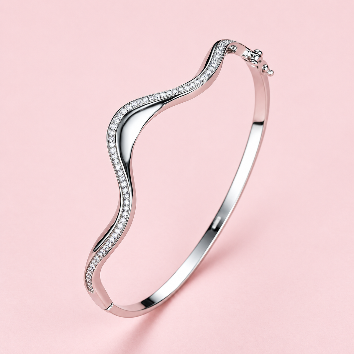 Sculpted Wave Bangle in rhodium-plated sterling silver with clear zircon detailing
