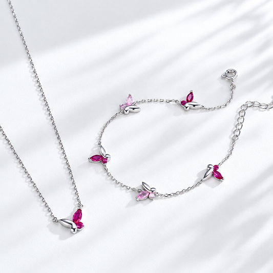 Blush Flutter sterling silver necklace and bracelet set with pink zircon butterfly-inspired details
