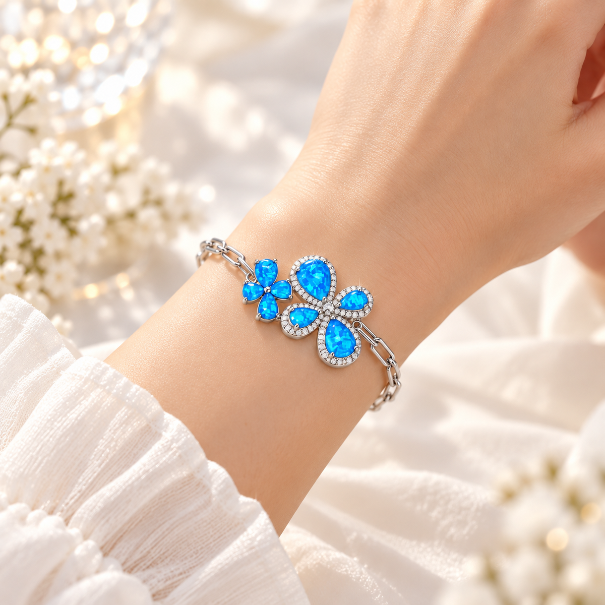 Butterfly Opal Bracelet in rhodium-plated 925 sterling silver with luminous blue opal details
