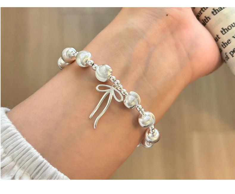 Cat's Eye Bead Bracelet detail and styling image by Avelune Collection