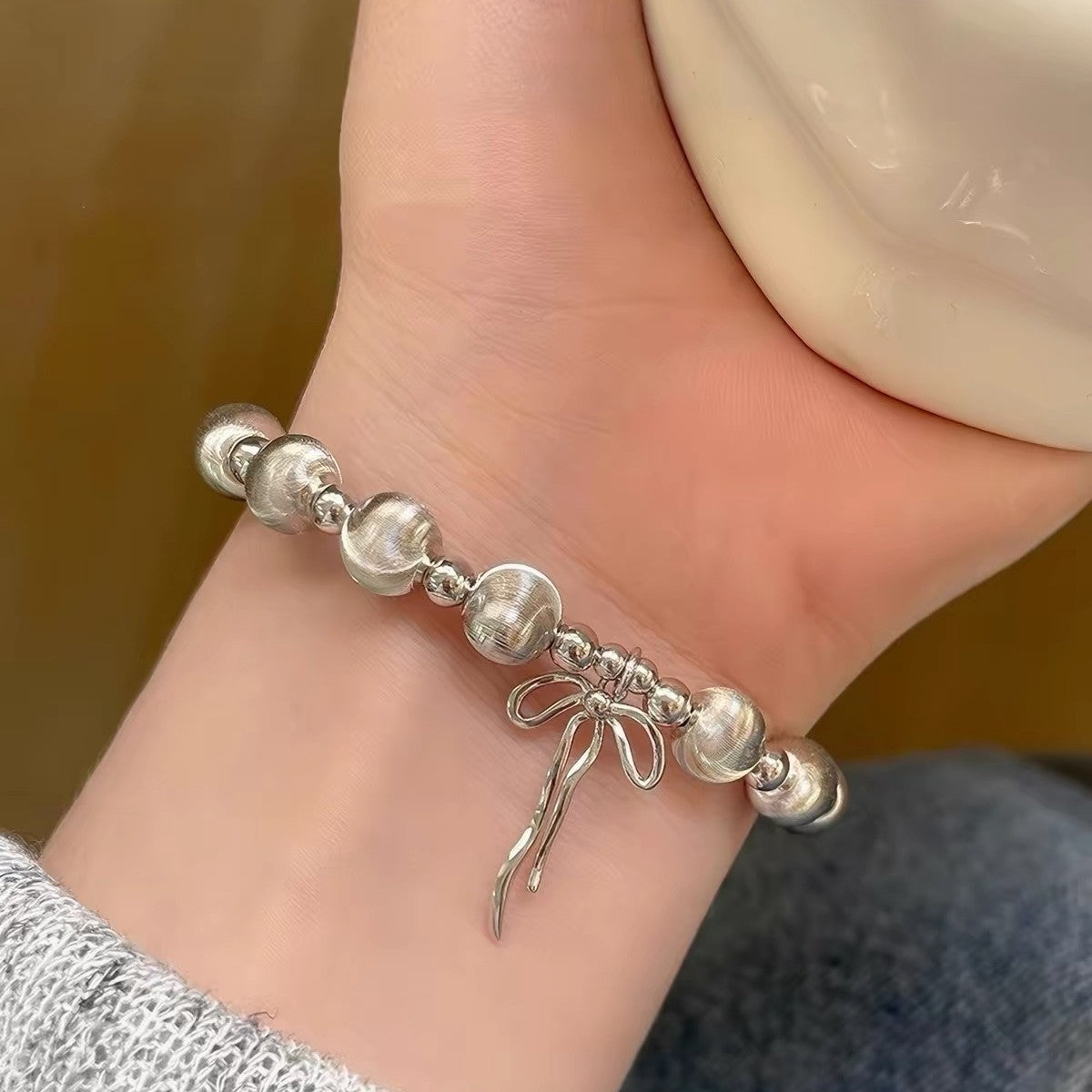 Cat's Eye Bead Bracelet detail and styling image by Avelune Collection