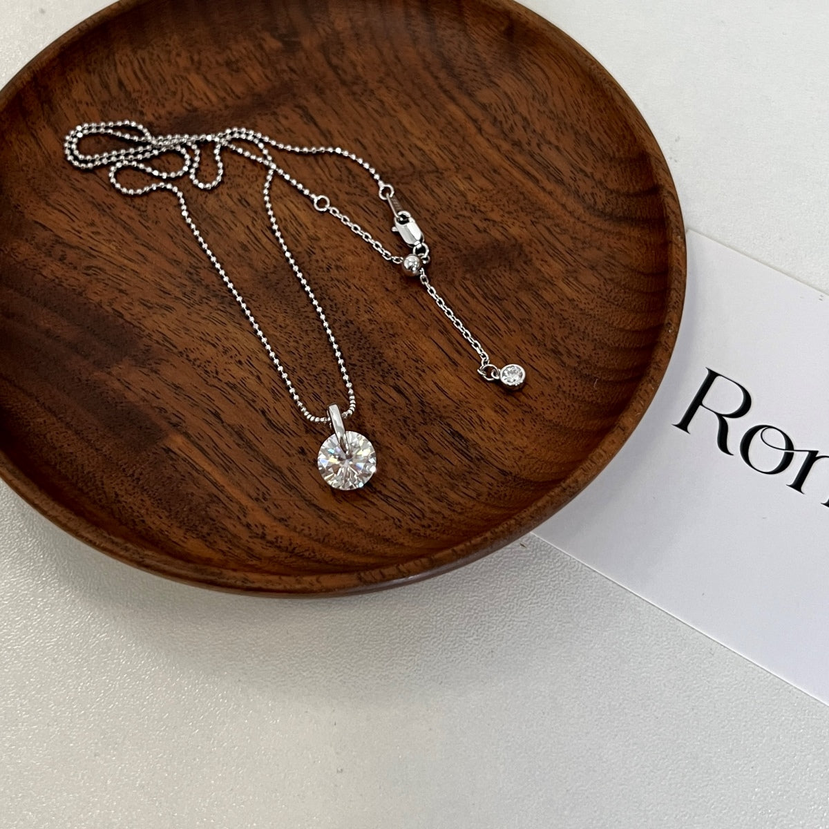 Stella 3 ct moissanite necklace in rhodium-plated sterling silver by Avelune Collection.