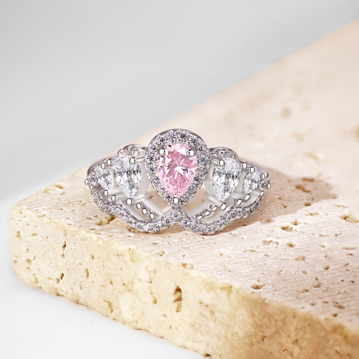 925 sterling silver ring with blush pink centre stone and clear sparkling halo accents