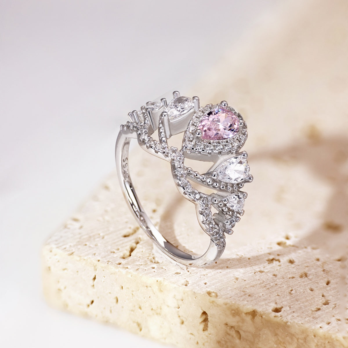 925 sterling silver ring with blush pink centre stone and clear sparkling halo accents